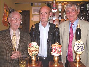 Former landlord Ron Siddall pulls the first pint at the re-furbished Red Lion in Lechlade