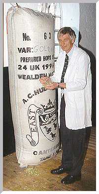 Head Brewer Don Bracher checks the quality of the hops