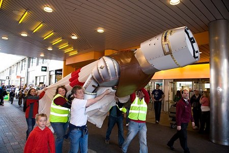 St. George statue is tilted to allow it to pass under the Brunel Shopping Centre walkway