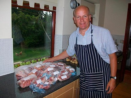 Peter with their home-grown meat