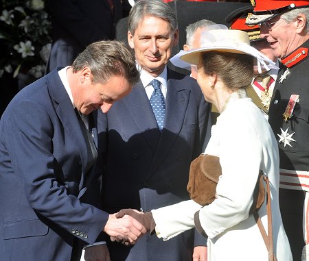 David Cameron bows to the Princess Royal at the Letter Patents ceremony at Royal Wootton Bassett