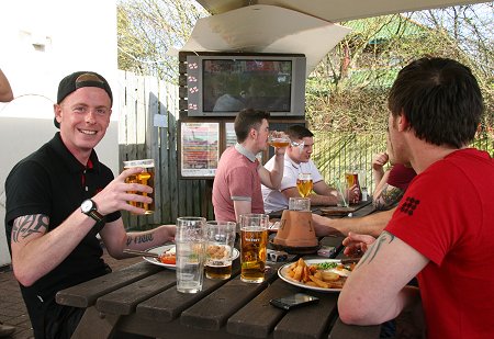 Swindon fans watch the Johnstone's Paint Trophy Final