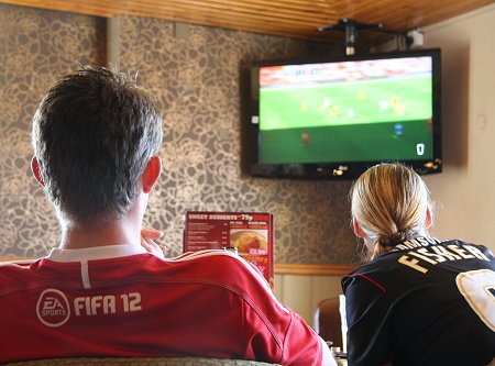 Swindon fans watch the Johnstone's Paint Trophy Final
