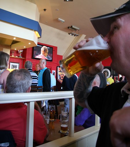 Swindon fans watch the Johnstone's Paint Trophy Final at the Moonrakers