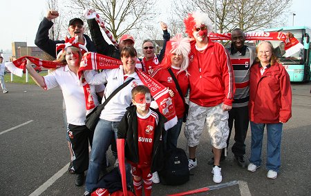 Swindon fans leave for Wembley from the County Ground