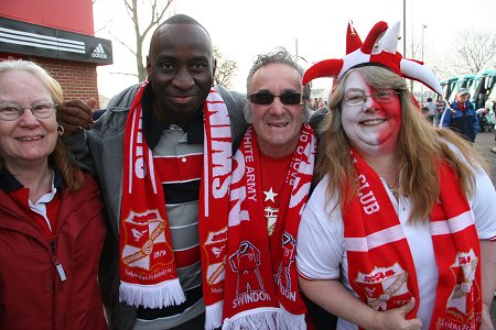 Swindon fans leave for Wembley from the County Ground