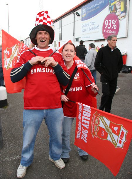 Swindon fans leave for Wembley from the County Ground