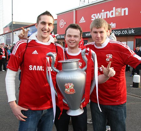 Swindon fans leave for Wembley from the County Ground
