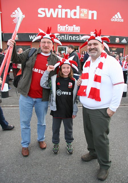 Swindon fans leave for Wembley from the County Ground