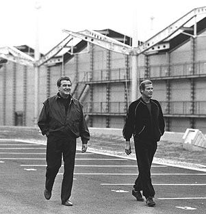 Roger Moore as james Bond filming at the Renualt Building, Swindon