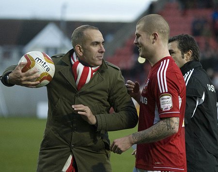 Paulo Di Canio steals the ball from James Collins