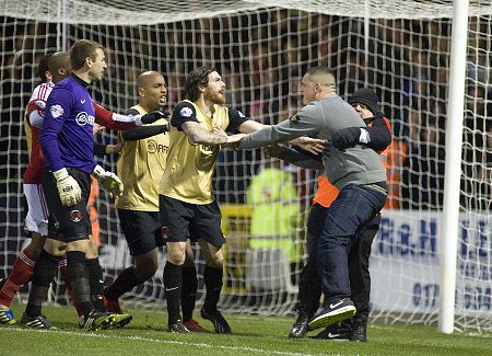 Fan attack Swindon v Orient