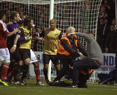 Fan attack Swindon v Orient