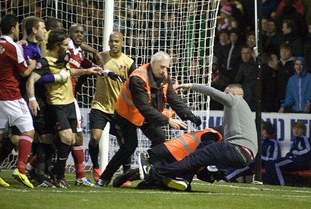 Fan attack Swindon v Orient