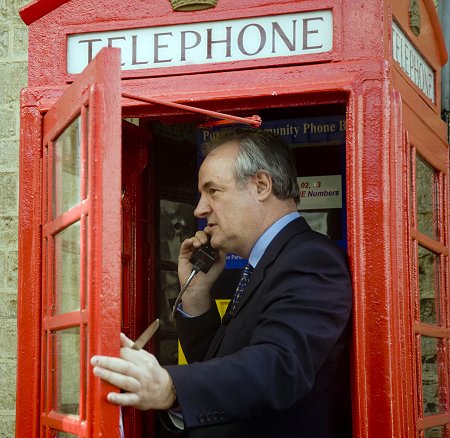 James Gray MP opening the Purton wi-fi phone box