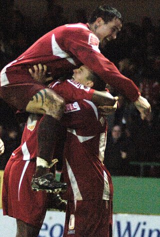 Jon Paul Mcgovern and the Town players celebarte the winning goal