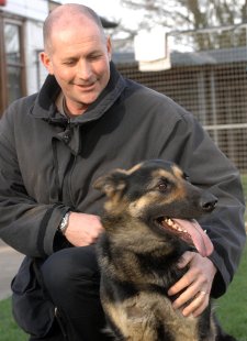 PC Neil Sampson with brave dog Anya