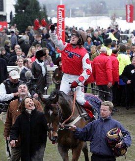 Robert Thornton celebrates on top of My Way To Solzen, the Alan King trained winner of the World Hurdle at Cheltenham 2006 - copyright racingfotos.com