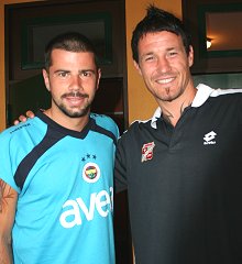 Swindon Town's Lee Peacock with Mateja Kezman