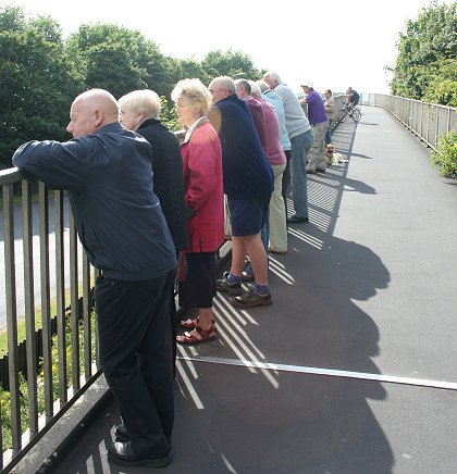 Crowds gather on the Gablecross walkway in Stratton St Margaret, Swindon