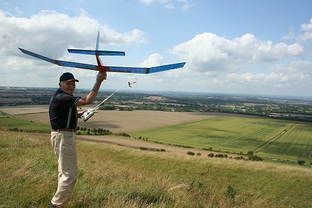 Ron Glover launches his model aircraft on Liddington Hill