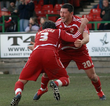 Billy Paynter and Alan Sheehan celebrate scoring Swindon's first