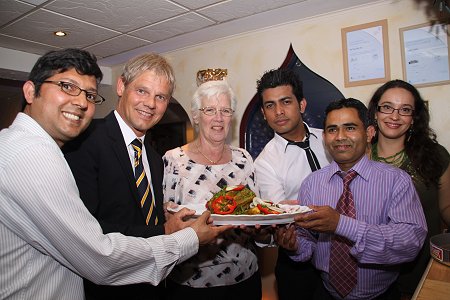 Salzgitter mayor Frank Klingebiel and family with Swindon major Ray Ballman at The Curry Place, Rodbourne, Swindon