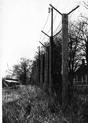 Former POW camp fence. 1975.<br>Stuart Dobson