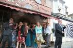 What's the score mate?! A wedding Party outside Fratello's shelter from the rain